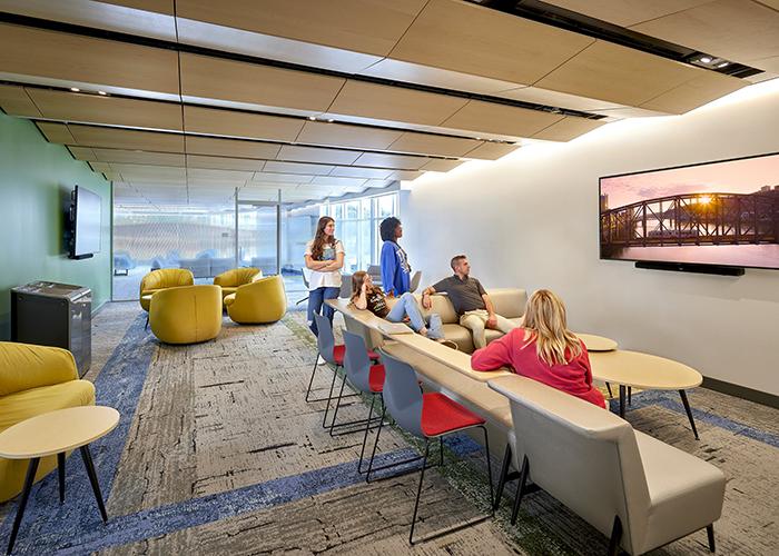 forbes beeler tv room with students sitting on a couch watching tv